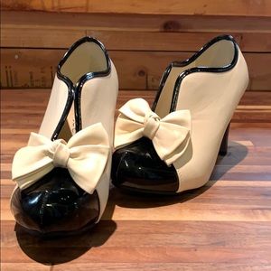 Manxixi ankle bootie heel